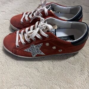 Golden goose burnt orange gently used sneakers for sale!